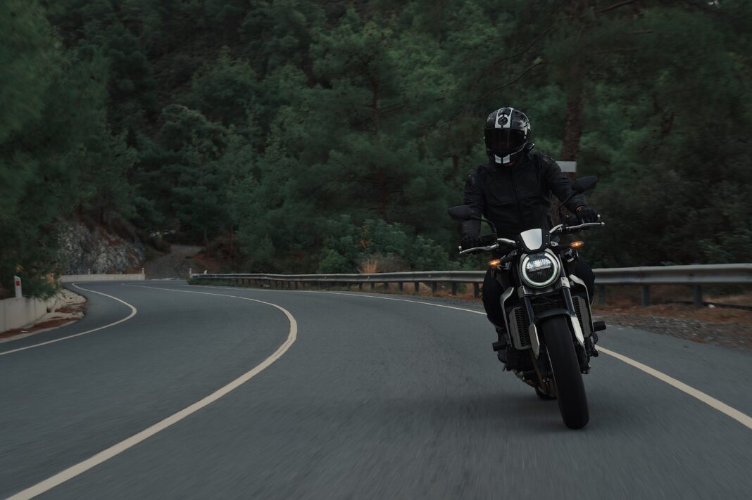 motorcyclist driving on highway